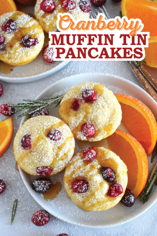 Say goodbye to standing over a griddle, watching and waiting for bubbles to form on your pancakes before flipping and watching and waiting some more. Cranberry Muffin Tin Pancakes are super easy to make, are completely customizable, and more importantly, are super fluffy and very flavourful! #pancakes #muffintin #holiday #breakfast #christmas #baked #cranberry #orange