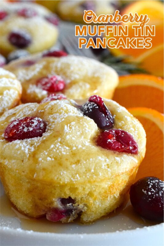 Say goodbye to standing over a griddle, watching and waiting for bubbles to form on your pancakes before flipping and watching and waiting some more. Cranberry Muffin Tin Pancakes are super easy to make, are completely customizable, and more importantly, are super fluffy and very flavourful! #pancakes #muffintin #holiday #breakfast #christmas #baked #cranberry #orange
